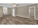 Cozy living room featuring new floors, neutral walls, and stairs leading to another level at 105 N Baldwin Ave, Kannapolis, NC 28083