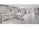 Beautiful kitchen island overlooks a bright living space, creating an inviting open concept at 11 Cobblestone Nw Ln, Concord, NC 28027