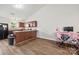 Open-concept kitchen features a breakfast bar, hardwood floors, and modern appliances at 117 S Canyon Ridge S Dr, Mount Holly, NC 28120