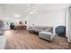 Bright living room features hardwood floors and opens to the kitchen area at 117 S Canyon Ridge S Dr, Mount Holly, NC 28120