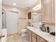 Bright bathroom featuring a double vanity with ample counter space, updated fixtures, and modern design at 11719 Withers Mill Dr, Charlotte, NC 28278