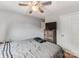 Serene bedroom featuring a neutral color scheme, ceiling fan, and dresser to create a cozy retreat at 11719 Withers Mill Dr, Charlotte, NC 28278
