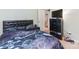 Comfortable bedroom featuring stylish, black furniture and cool neon light for a relaxing atmosphere at 11719 Withers Mill Dr, Charlotte, NC 28278