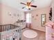 Charming Bedroom with soft colors and adorable decor, ideal for creating a cozy and welcoming space at 11719 Withers Mill Dr, Charlotte, NC 28278