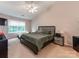 Bedroom featuring neutral walls, a ceiling fan, and natural light at 11719 Withers Mill Dr, Charlotte, NC 28278
