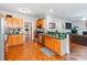 Bright kitchen features wooden cabinets, green countertops, and stainless steel appliances at 11719 Withers Mill Dr, Charlotte, NC 28278