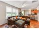 Spacious living room with a large sectional sofa and open layout connecting to the kitchen at 11719 Withers Mill Dr, Charlotte, NC 28278