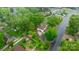 Aerial view of the home showcasing lush greenery, mature trees, and neighborhood streets at 1287 Queensgate St, Gastonia, NC 28054