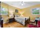 Comfortable bedroom featuring hardwood floors and natural light from the two windows at 1287 Queensgate St, Gastonia, NC 28054