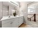Bright bathroom with dual sinks and a large mirror at 13216 Old Compton Ct, Pineville, NC 28134