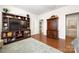 Bright bedroom with an entertainment center and view of the bathroom at 13216 Old Compton Ct, Pineville, NC 28134