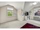 Well-lit bonus room featuring a sink, large windows, and a comfortable setting for hobbies or entertainment at 13216 Old Compton Ct, Pineville, NC 28134
