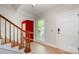 Inviting entryway with tile floor, staircase, and bright natural light at 1340 Piccadilly Dr, Charlotte, NC 28211