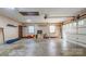 Spacious garage with ample storage and a roll up garage door at 1340 Piccadilly Dr, Charlotte, NC 28211