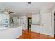 Open-concept kitchen with a view of the dining area, white cabinets and granite countertops at 1340 Piccadilly Dr, Charlotte, NC 28211