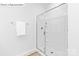 This bathroom boasts a glass-enclosed shower with neutral tile, and a towel bar at 1352 Secrest Commons Dr, Monroe, NC 28112