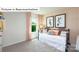 Bedroom with stylish decor, comfortable bed, bedside table and bright window at 1356 Secrest Commons Dr, Monroe, NC 28112