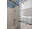 Neutral bathroom, with a tub and a shower, accessible through a doorway in the main bedroom at 18305 Dembridge Dr, Davidson, NC 28036