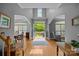 Elegant foyer featuring hardwood floors, arched entryways and light gray walls at 18305 Dembridge Dr, Davidson, NC 28036