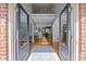 Welcoming foyer with hardwood floors and a view of the staircase at 18305 Dembridge Dr, Davidson, NC 28036