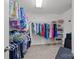A well-organized walk-in closet with ample hanging space, shelving, and storage solutions at 18305 Dembridge Dr, Davidson, NC 28036