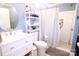 Updated bathroom with a tiled shower, vanity, and ample storage at 201 Mitchell St, Belmont, NC 28012