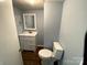 Bathroom with a white vanity and modern toilet at 201 Mitchell St, Belmont, NC 28012