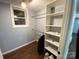Walk-in closet with custom shelving and ample storage space at 201 Mitchell St, Belmont, NC 28012