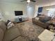 Cozy living room with hardwood floors, natural light, and comfortable seating at 201 Mitchell St, Belmont, NC 28012