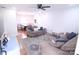 Spacious living room with a dining area, featuring hardwood floors and neutral walls at 201 Mitchell St, Belmont, NC 28012