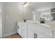 Dual sink bathroom vanity with modern fixtures and ample cabinet space at 2020 Embassy Ct # 48, Charlotte, NC 28213
