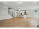Open concept living space with a large island kitchen with modern appliances at 2020 Embassy Ct # 48, Charlotte, NC 28213