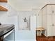 Dog washing station featuring tiled walls, a showerhead, storage lockers and a bench at 2417 Calais Pl, Charlotte, NC 28211