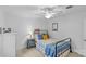 Bright bedroom with a ceiling fan, comfortable bed, and window view at 2418 Ainsdale Rd, Charlotte, NC 28226