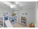 Charming room with a bunk bed, a slide, and playful decor creates a fun and inviting space at 2418 Ainsdale Rd, Charlotte, NC 28226