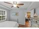Serene bedroom featuring hardwood floors, a comfy bed, and view into the living room at 2418 Ainsdale Rd, Charlotte, NC 28226