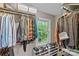 Walk-in closet featuring custom shelving and ample storage space at 2418 Ainsdale Rd, Charlotte, NC 28226