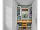Charming office nook with white cabinetry, wood desktop, and natural light through the window at 2418 Ainsdale Rd, Charlotte, NC 28226