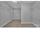 Walk-in closet featuring carpet flooring, wire shelving, and ample space for all your storage needs at 3075 Jamestown Dr, Gastonia, NC 28054