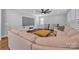 Spacious living room with a large sectional, plantation shutters and entertainment center at 3075 Jamestown Dr, Gastonia, NC 28054