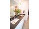 Elegant bathroom with double sinks, sleek countertops, and modern fixtures, offering a spa-like experience at 313 Old Town Village Rd, Waxhaw, NC 28173