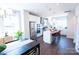 Bright and modern kitchen featuring a large island, stainless steel appliances, and stylish pendant lighting at 313 Old Town Village Rd, Waxhaw, NC 28173