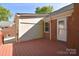 Exterior view of the home with a lovely deck at 317 Port Royal Dr, Matthews, NC 28105