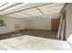 Spacious garage interior with ample storage and a utility door at 317 Port Royal Dr, Matthews, NC 28105