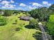 Expansive lawn with mature trees complements this charming home with driveway and surrounding properties at 3270 Kings Row Dr, Rock Hill, SC 29732