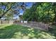 Large fenced backyard space with a chicken coop and mature trees around the perimeter at 3270 Kings Row Dr, Rock Hill, SC 29732