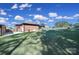 Spacious backyard with patio area and lush green lawn extends from a brick home at 3270 Kings Row Dr, Rock Hill, SC 29732