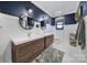 Stylish bathroom with double vanity, modern fixtures, and wood accents at 3270 Kings Row Dr, Rock Hill, SC 29732