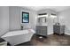 Bright and airy bathroom with double vanities, modern tub, and stylish finishes at 3270 Kings Row Dr, Rock Hill, SC 29732