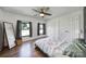 Cozy bedroom with wood floors, two windows, and closet at 3270 Kings Row Dr, Rock Hill, SC 29732
